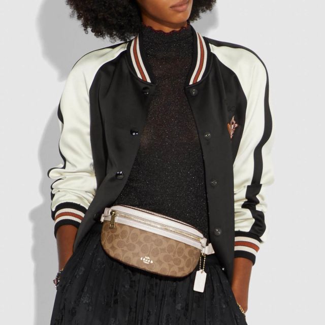 Rider belt bag in signature canvas 2025
